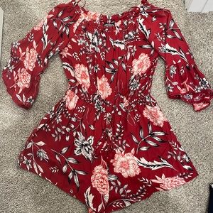 Super cute size medium Angie Brand red floral romper